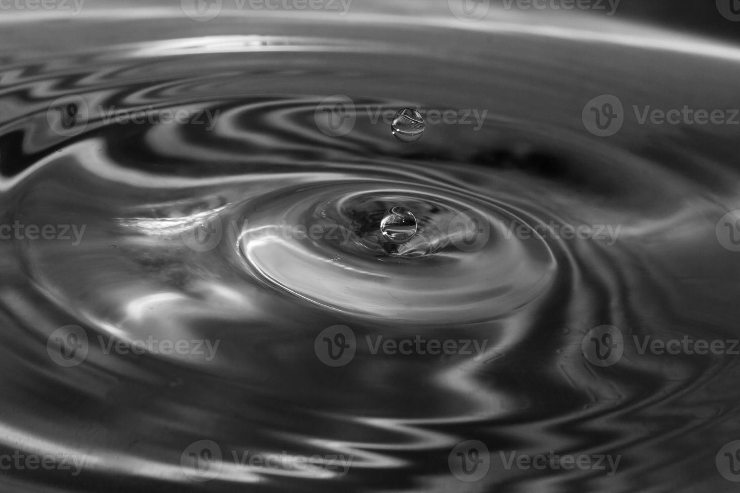 falling drops in water photo