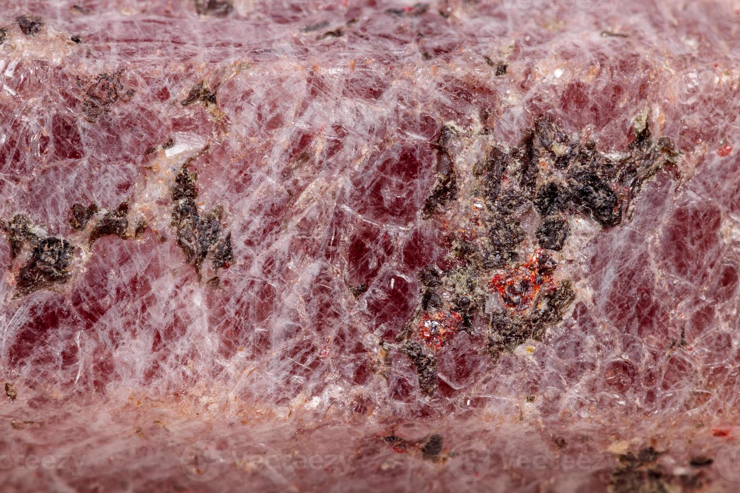 Macro mineral stone Ruby in the breed a white background photo