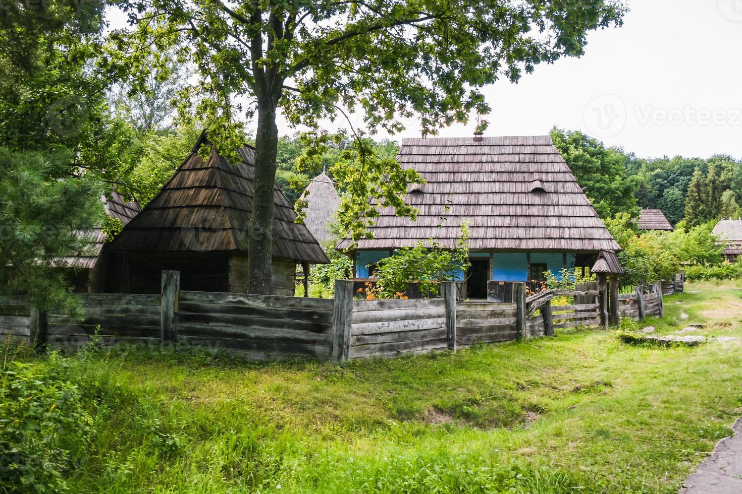 Old rural house in the summer season photo