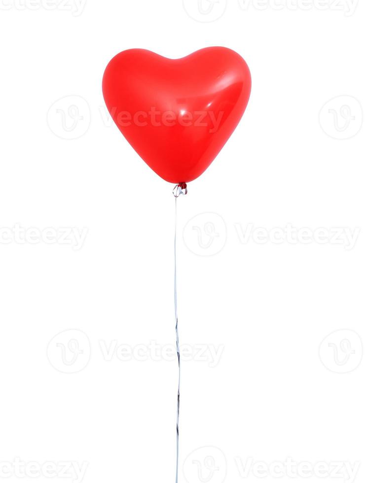 Red heart shaped helium balloon isolated on white background with ropes, Valentine's day, Mother's day, birthday party design concept. Clipping path. photo