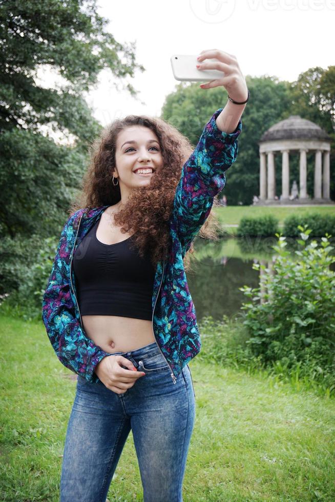 young woman taking selfie photo