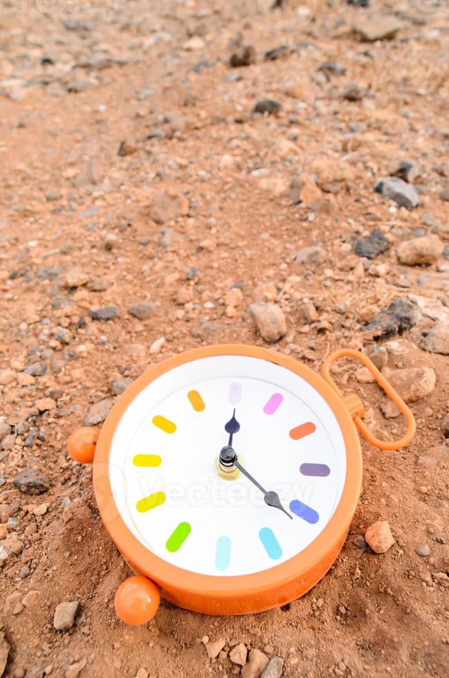 Clock on the ground photo