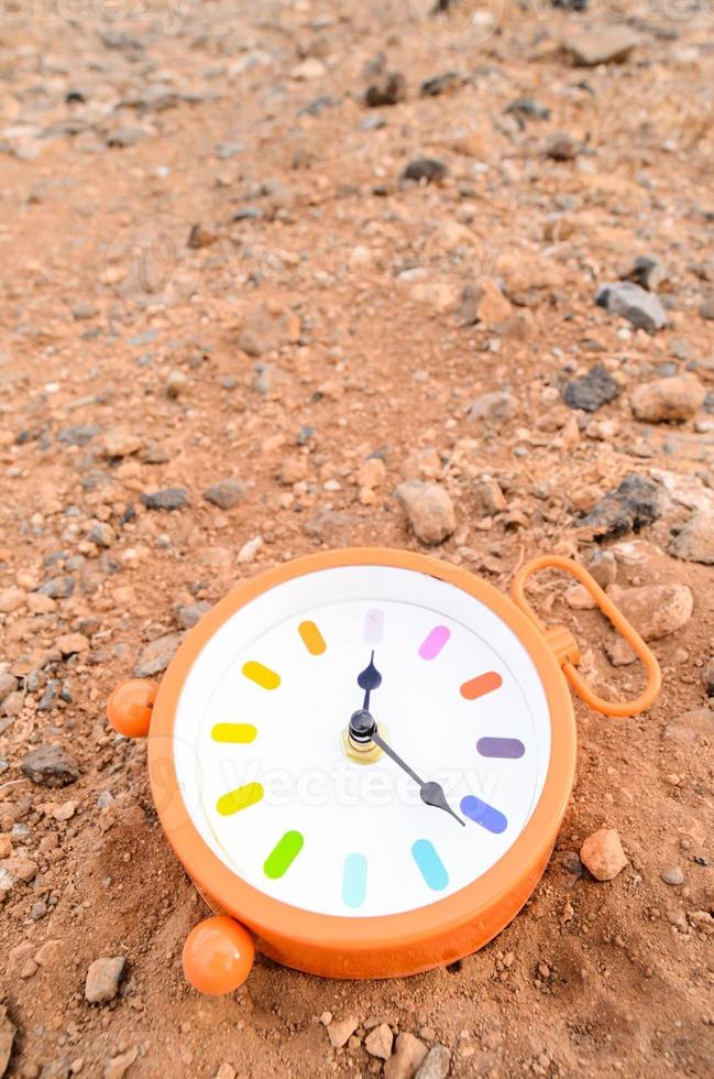 Clock on the ground photo