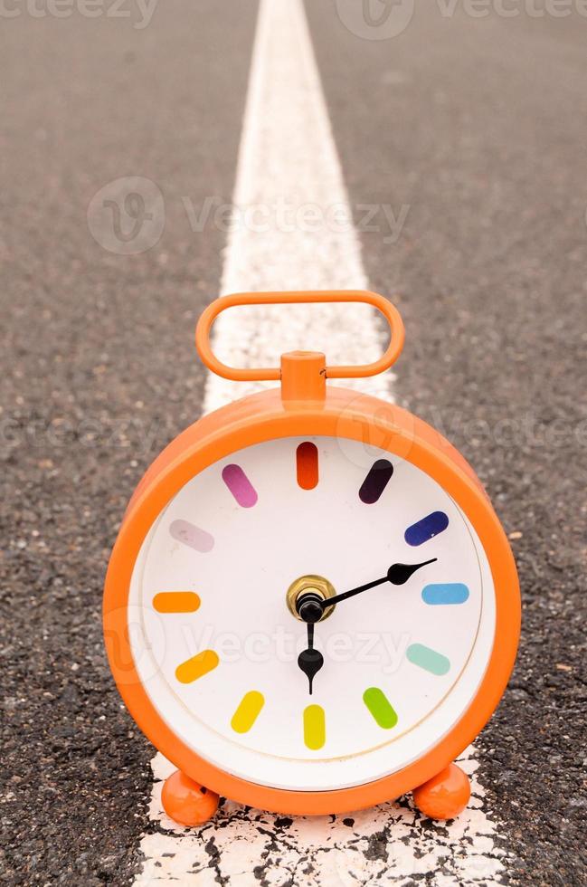 Clock on the ground photo