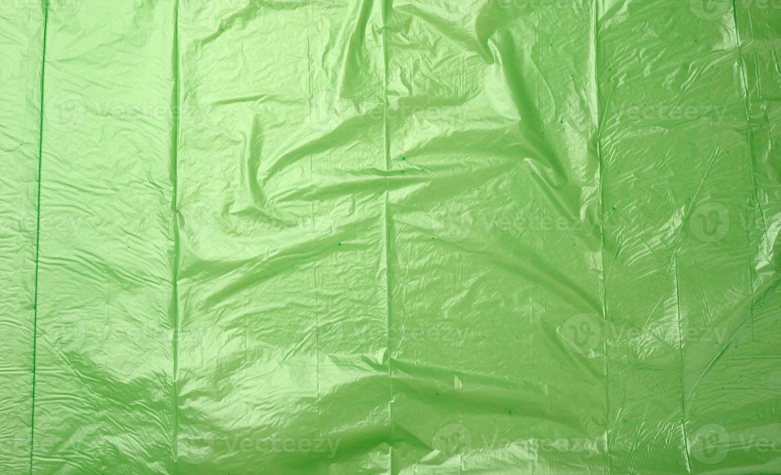 crumpled green polyethylene texture, close up, full frame photo