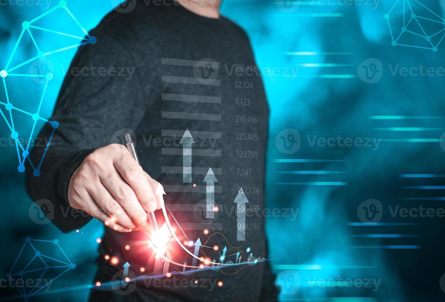 Businessmen draw growth graphs and progress of business and analyze financial, and investment.Use technology to plan strategy to success goals and growth.online business, e-commerce, online marketing. photo