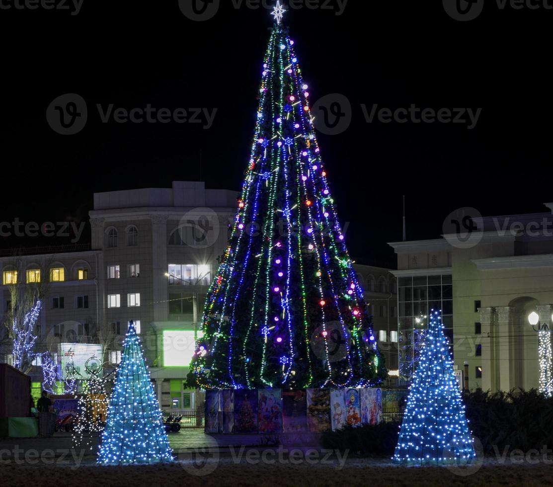 city square with christmas tree at night, city Kherson photo