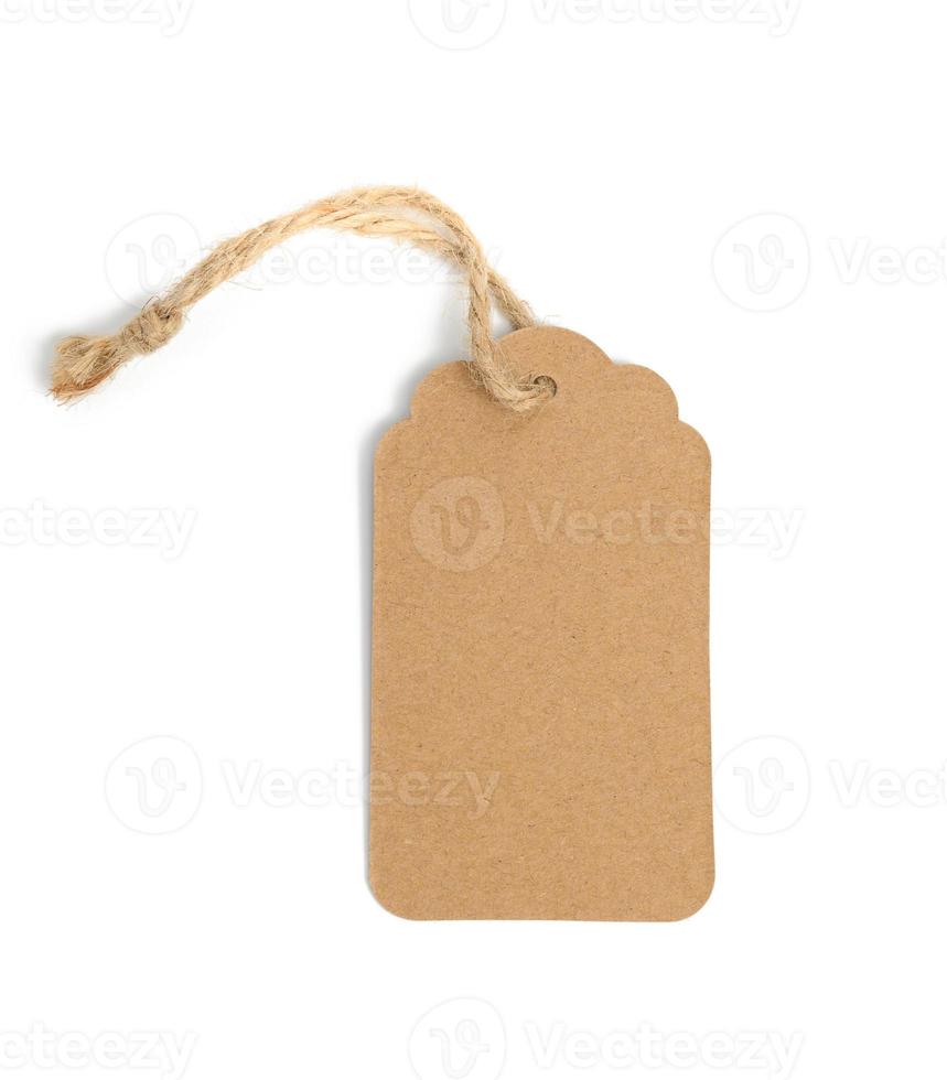 blank brown rectangular brown paper tag on a rope isolated on white background photo