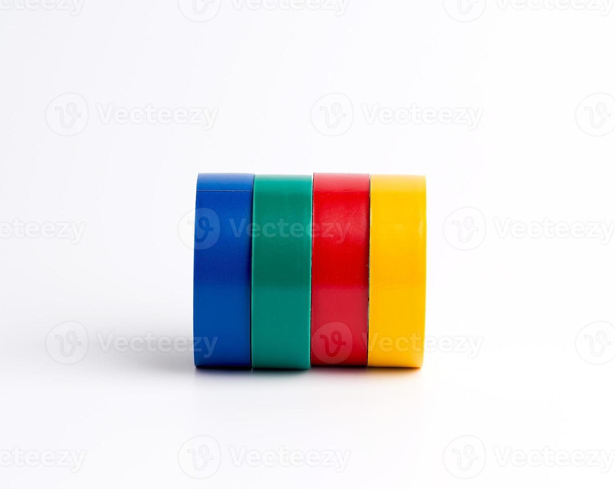 full coils of multi-colored insulating tape on a white background photo