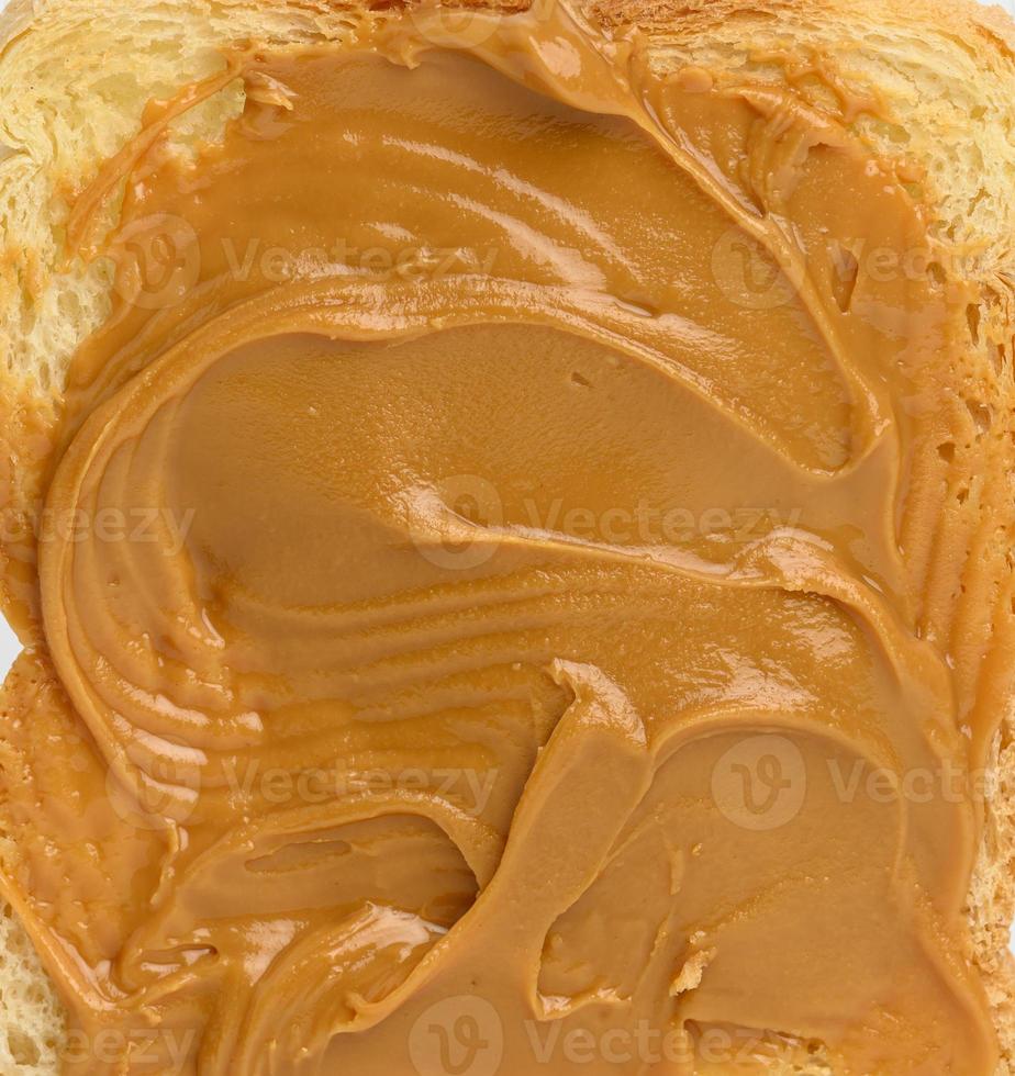 texture of peanut butter spread on bread, full frame 19581718 Stock