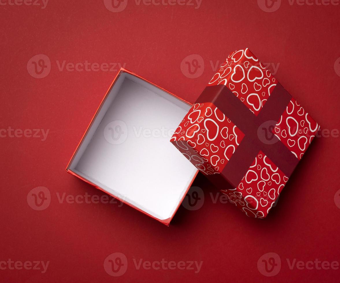 empty square red box on a red background, gift open photo