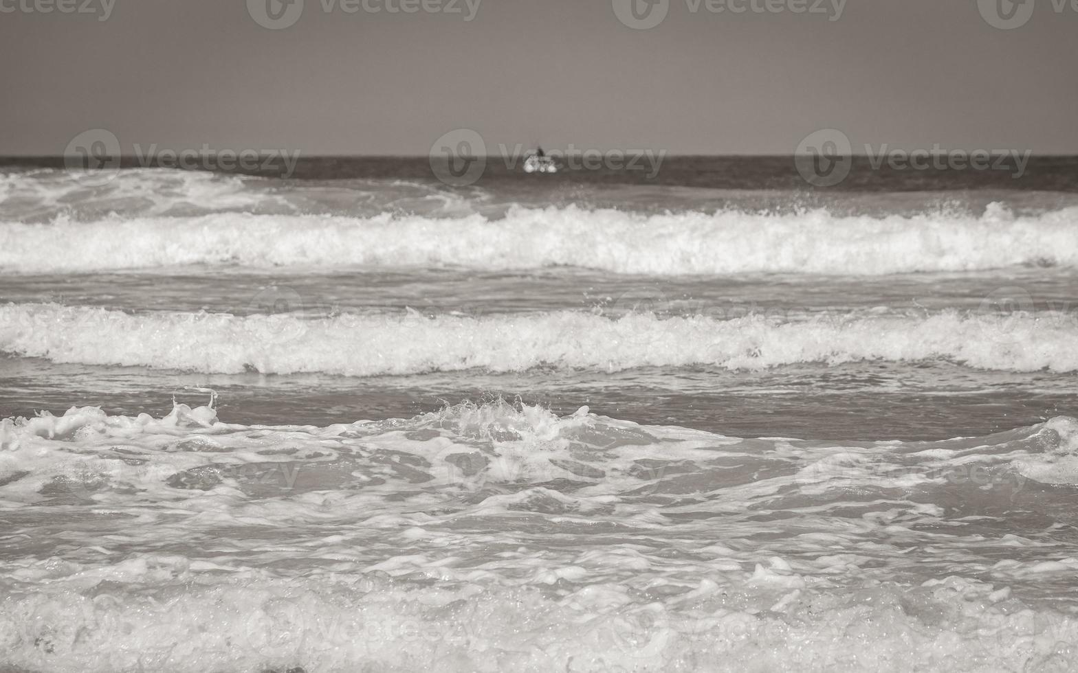 Fish Hoek Beach False Bay turquoise water waves Cape Town. photo