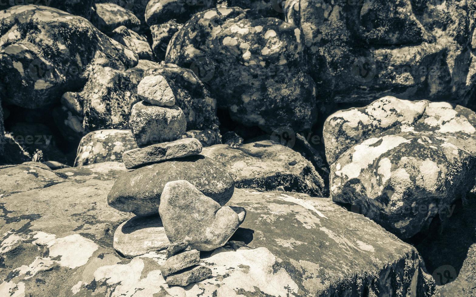 Stacked stones as a guide for hikers Table Mountain Nationalpark. photo