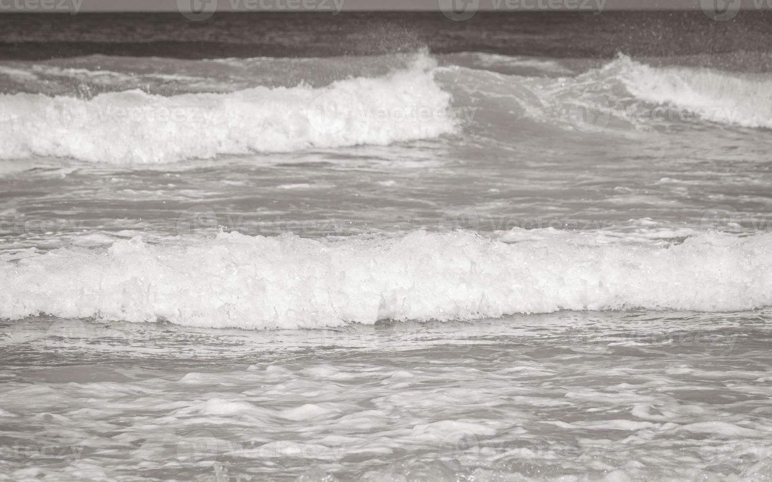 Fish Hoek Beach False Bay turquoise water waves Cape Town. photo