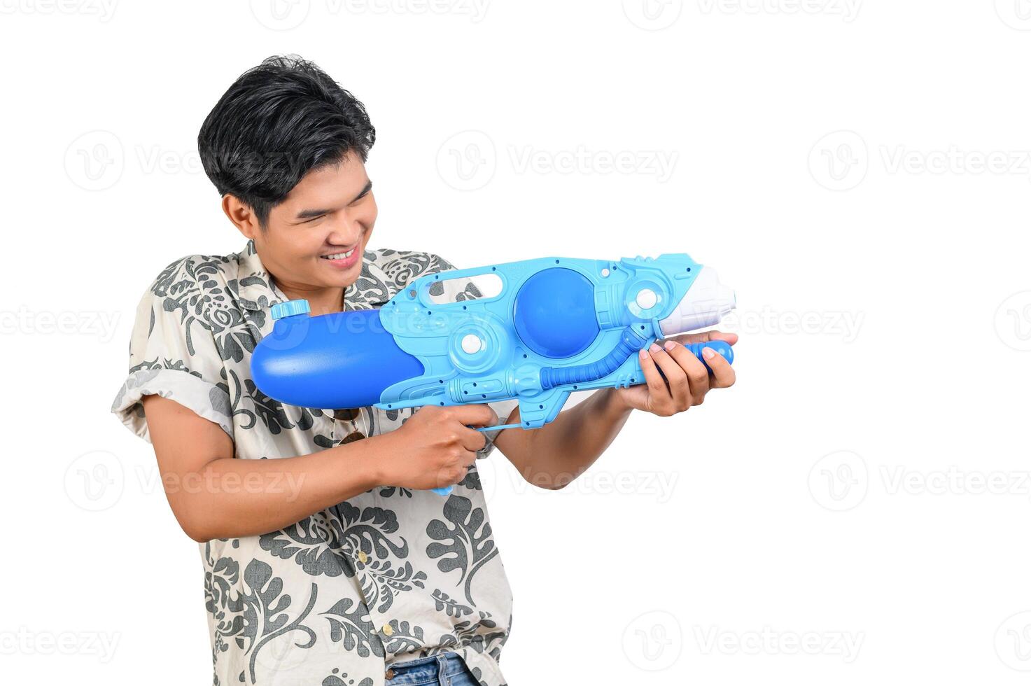 Portrait young man with water bowl in Songkran Festival photo