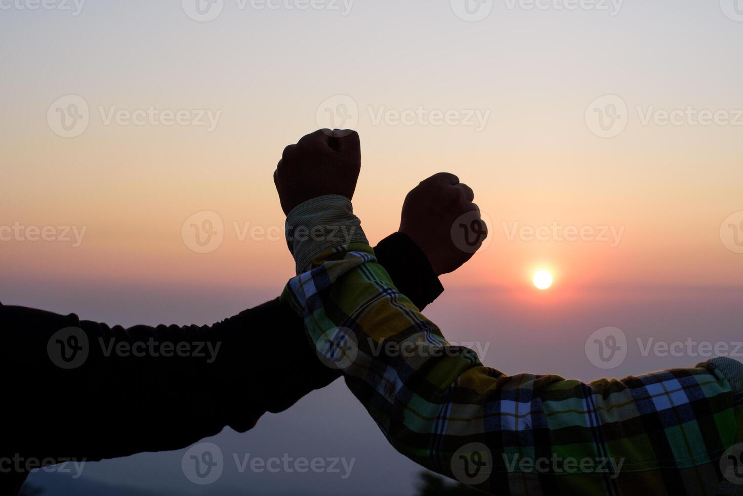 Silhouette close-up of Teamwork helping hand trust help photo