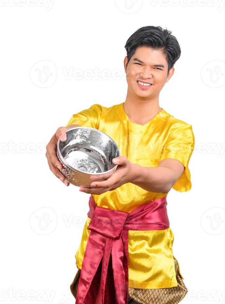 Portrait young man with water bowl in Songkran Festival photo