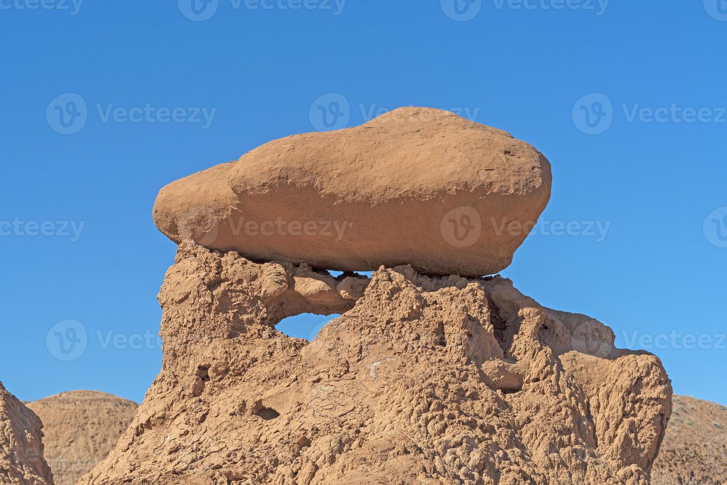 Eroded Boulder on Crumbling Siltstone photo
