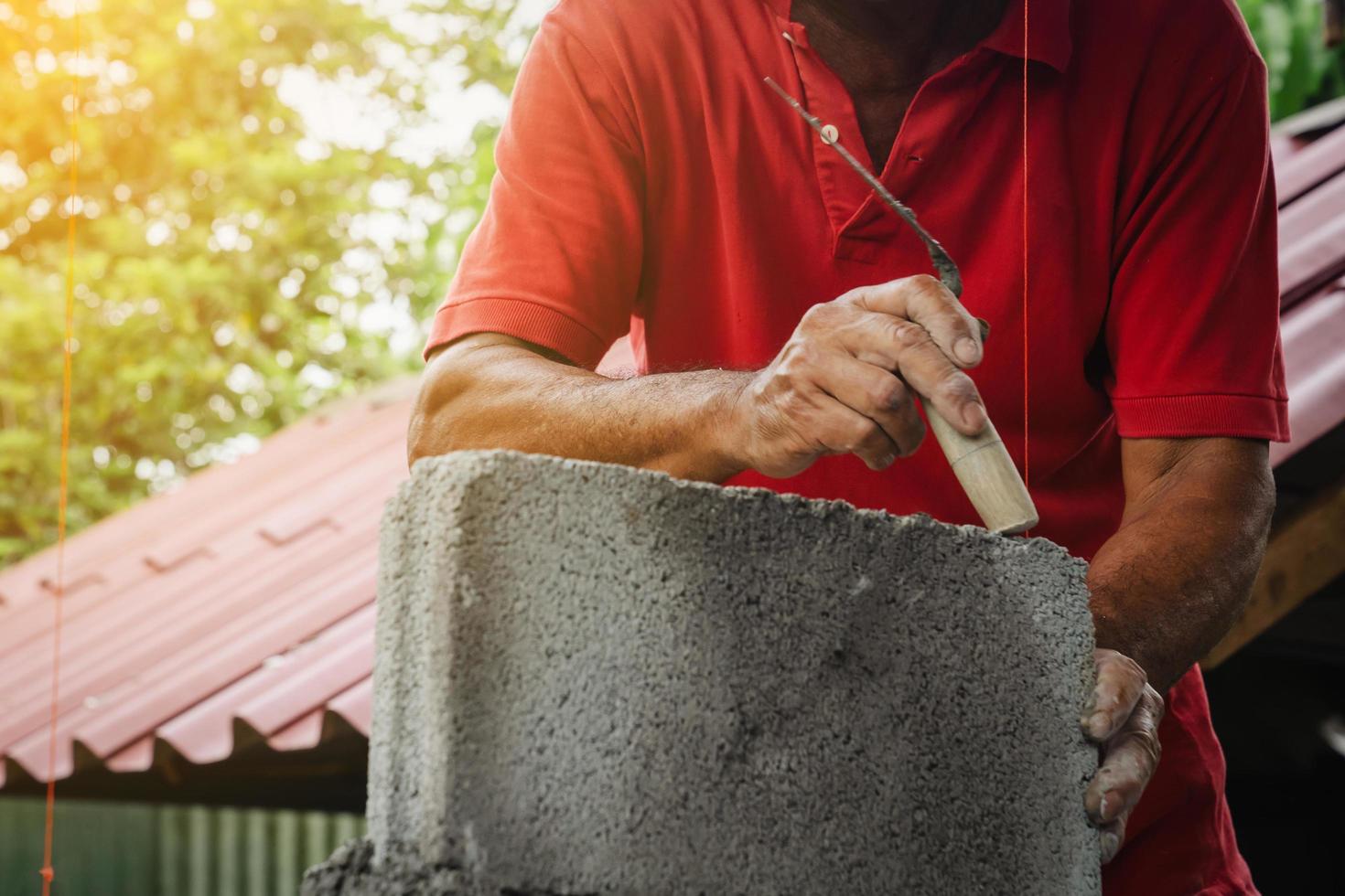 bricklayer man working build for construction at home photo
