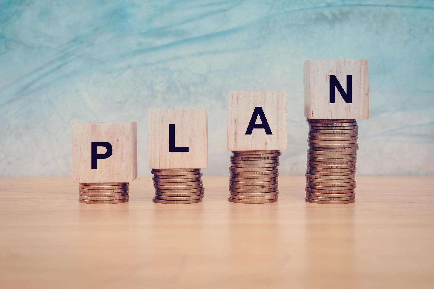 Business concept. Wooden Blocks With text Plan on table. Copy space photo