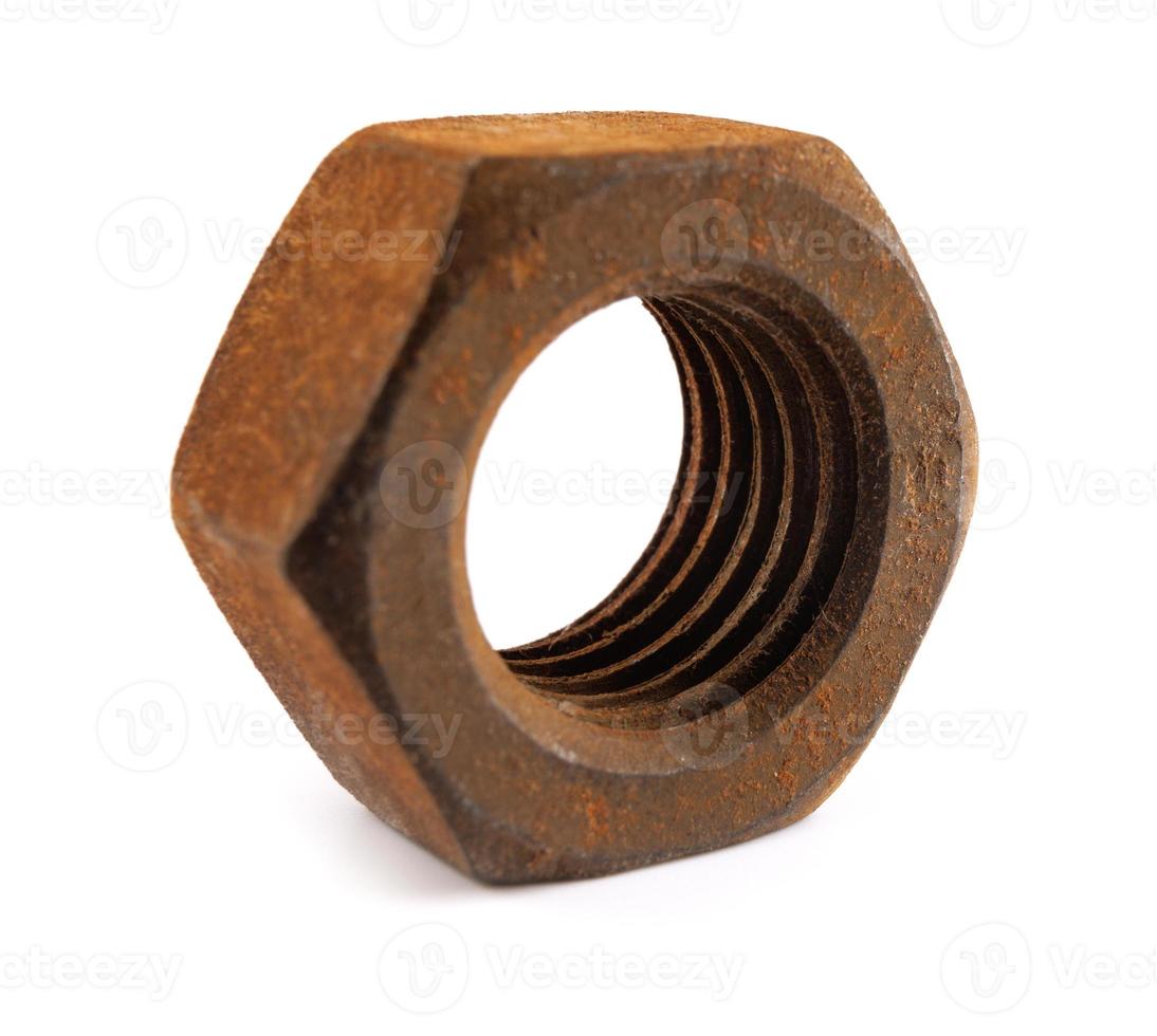 Old rusty nut isolated on white background. Full clipping path. photo