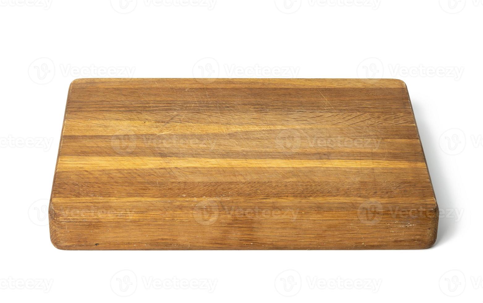 empty brown rectangular wooden cutting kitchen board isolated on white background photo