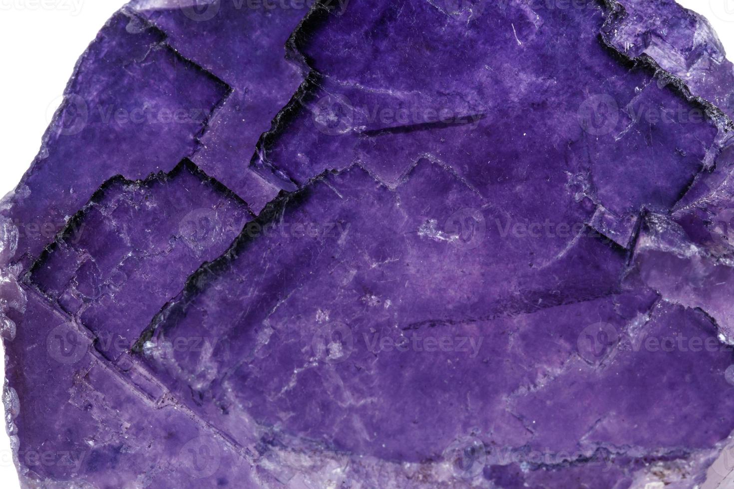 Macro mineral stone Fluorite on a white background photo