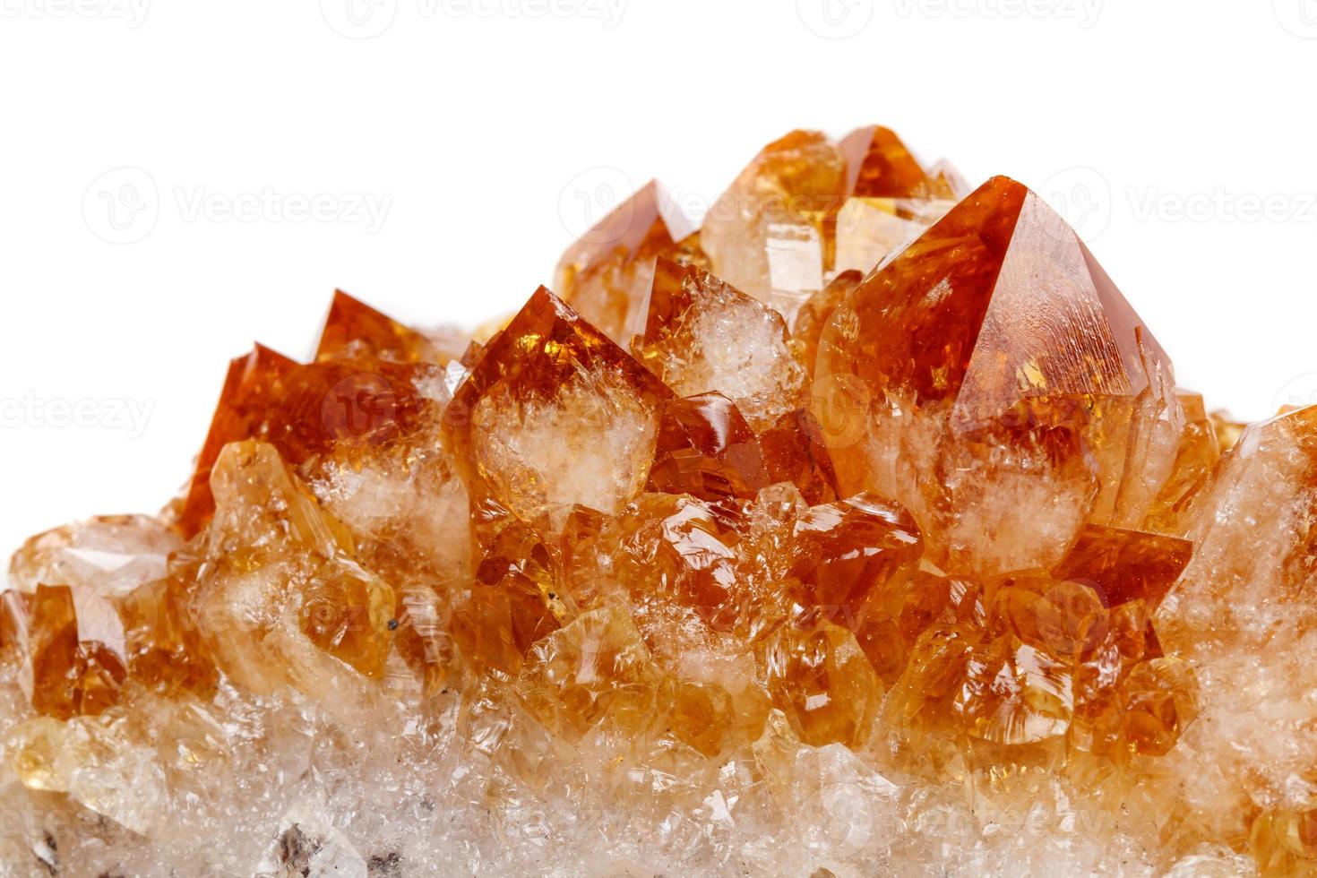 Macro mineral stone Citrine in rock in crystals on a white background photo