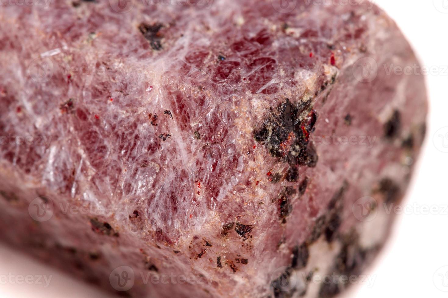 Macro mineral stone Ruby in the breed a white background photo