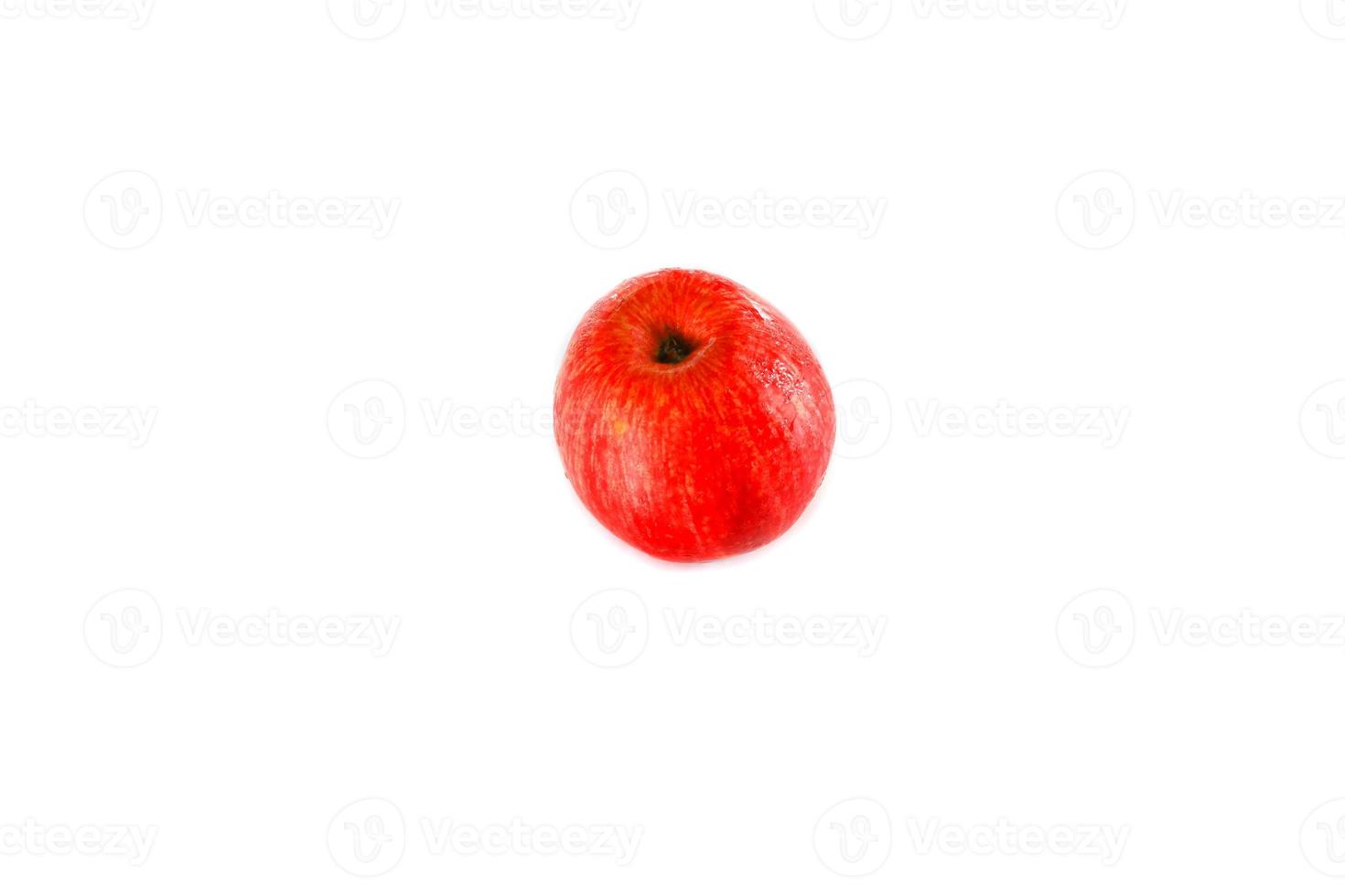 red apple and water drip  on white background photo