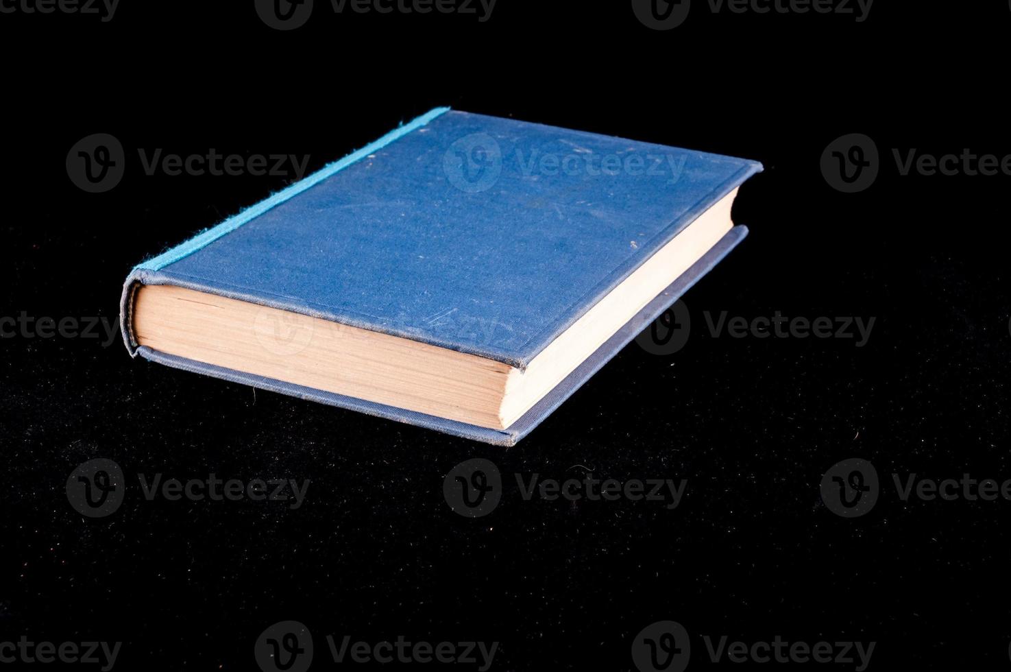 Isolated book on black background photo