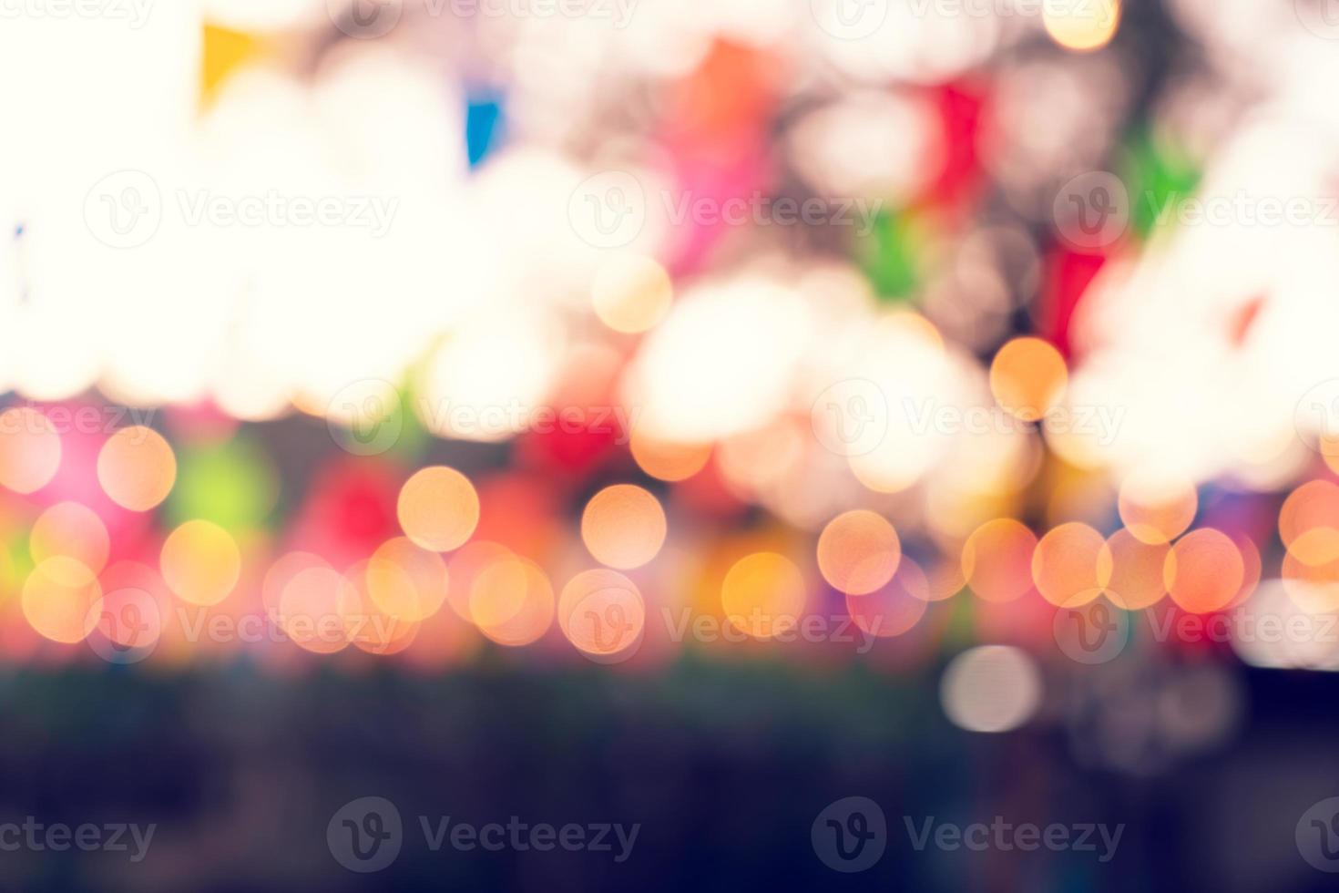 Party bokeh at night market festival,abstract blur image background photo