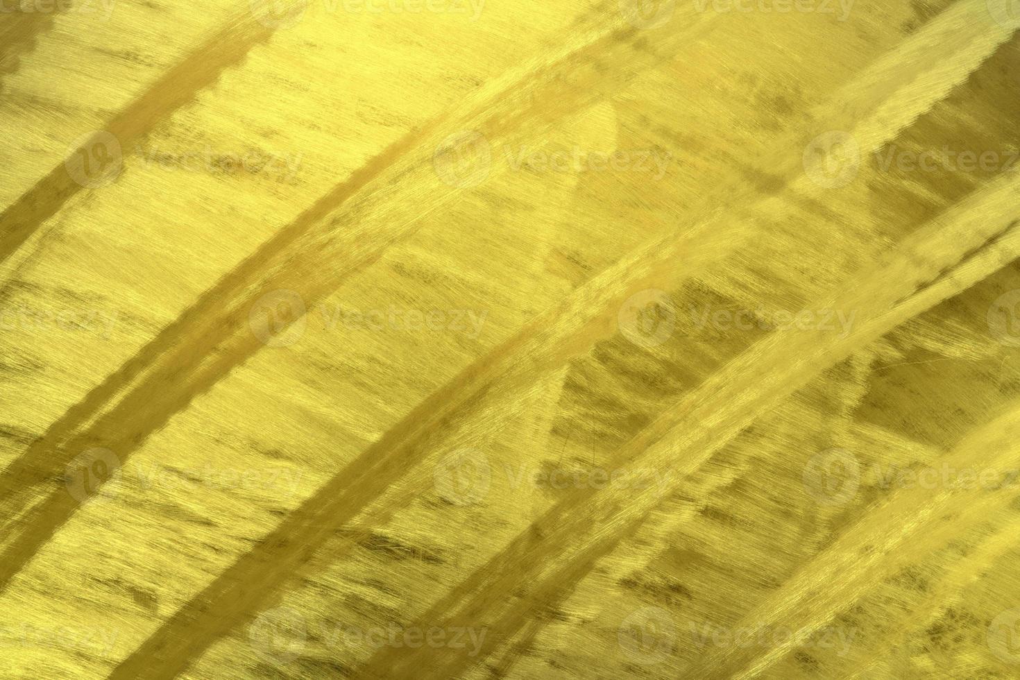 Shiny golden metal wall texture background,gold pattern photo