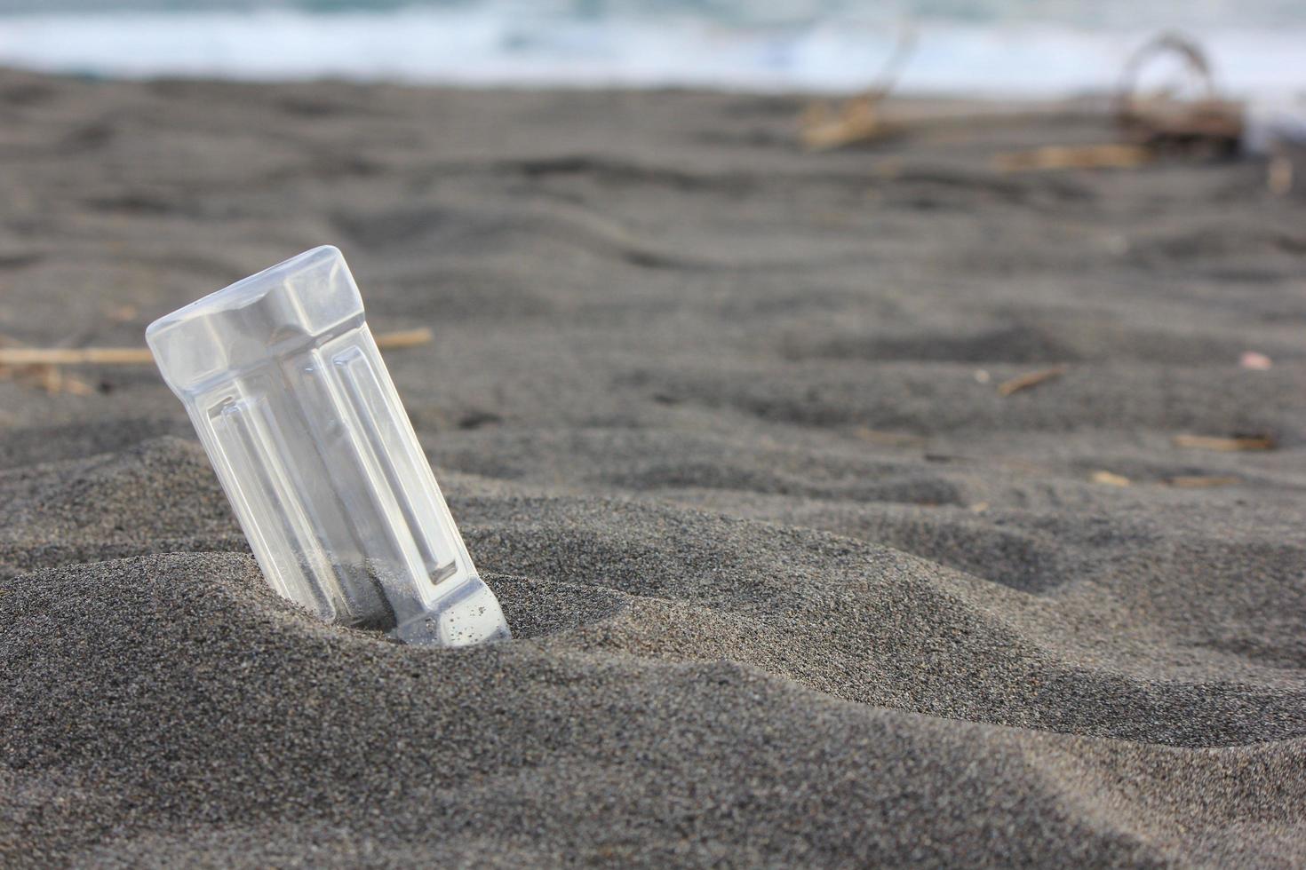 photo of a plain used bottle with daylight