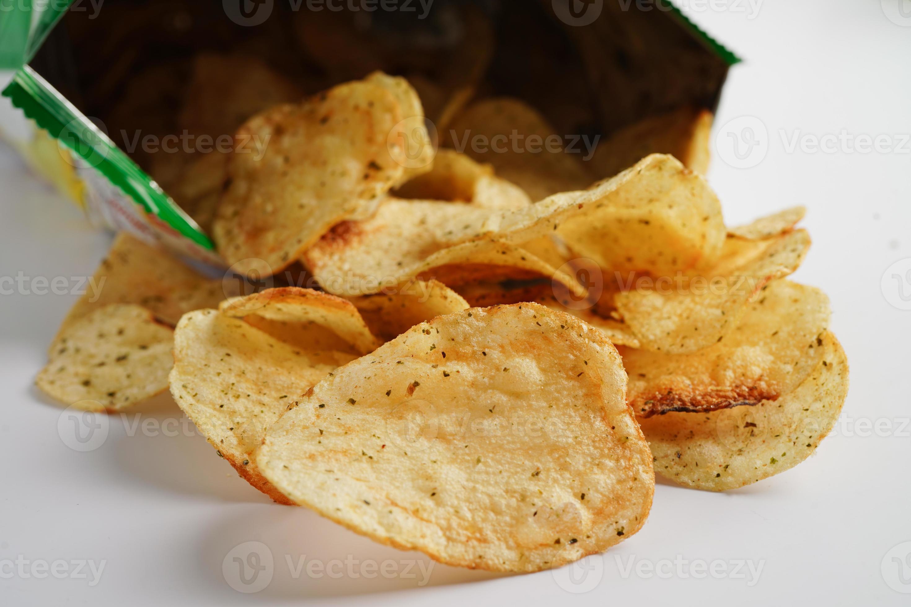 Potato chips in open bag, delicious BBQ seasoning spicy for crips, thin