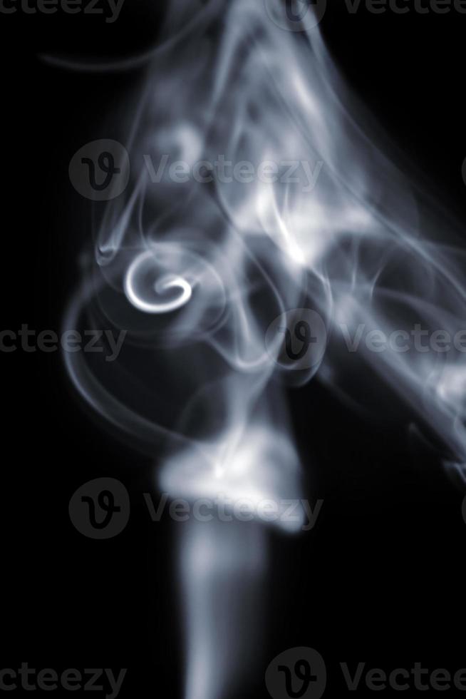 White smoke on black background photo