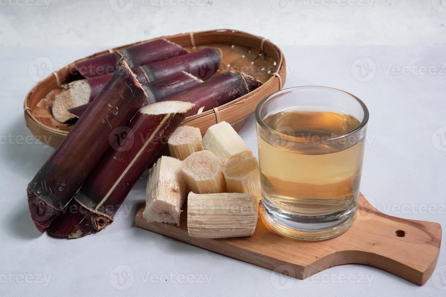 black sugarcane pieces, useful for relieving coughs and sore throats. with the scientific name Saccharum sp photo