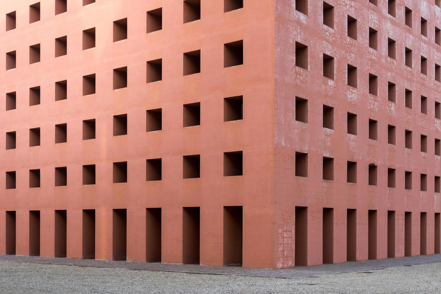 Modena,Italy-February 6, 2022-strolling inside the  cemetery of Modena by the Italian architects Aldo Rossi and Gianni Braghieri during a cloudy day. photo