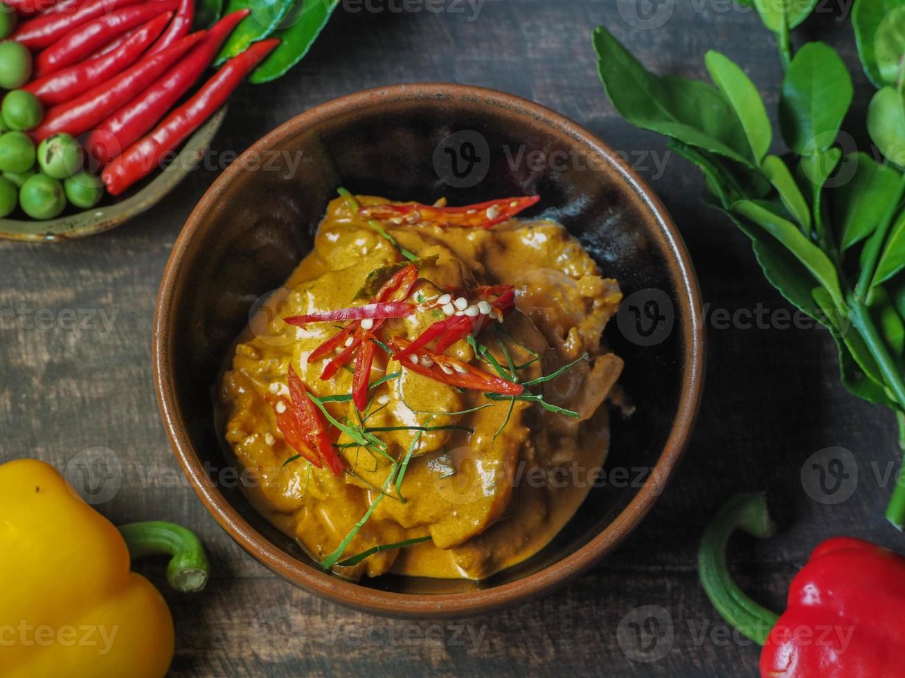 A set of Thai food on a wood table with beautiful light photo