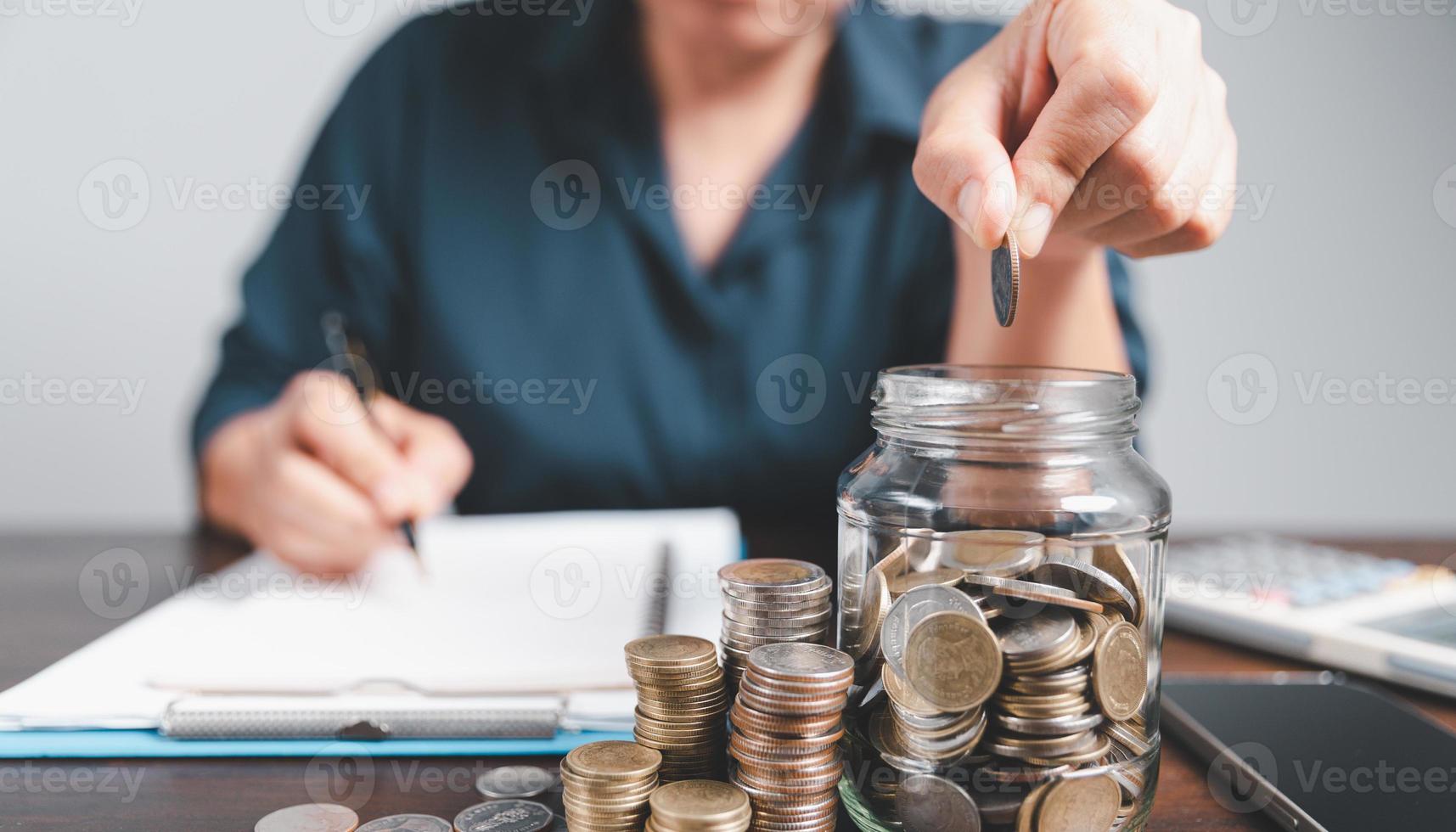 Saving investment banking finance concept. Stack of coins with piggy bank on the table. Growth of loan and investment business idea. Asset Management, Funds, Liabilities, Deposits, Income, Successful. photo