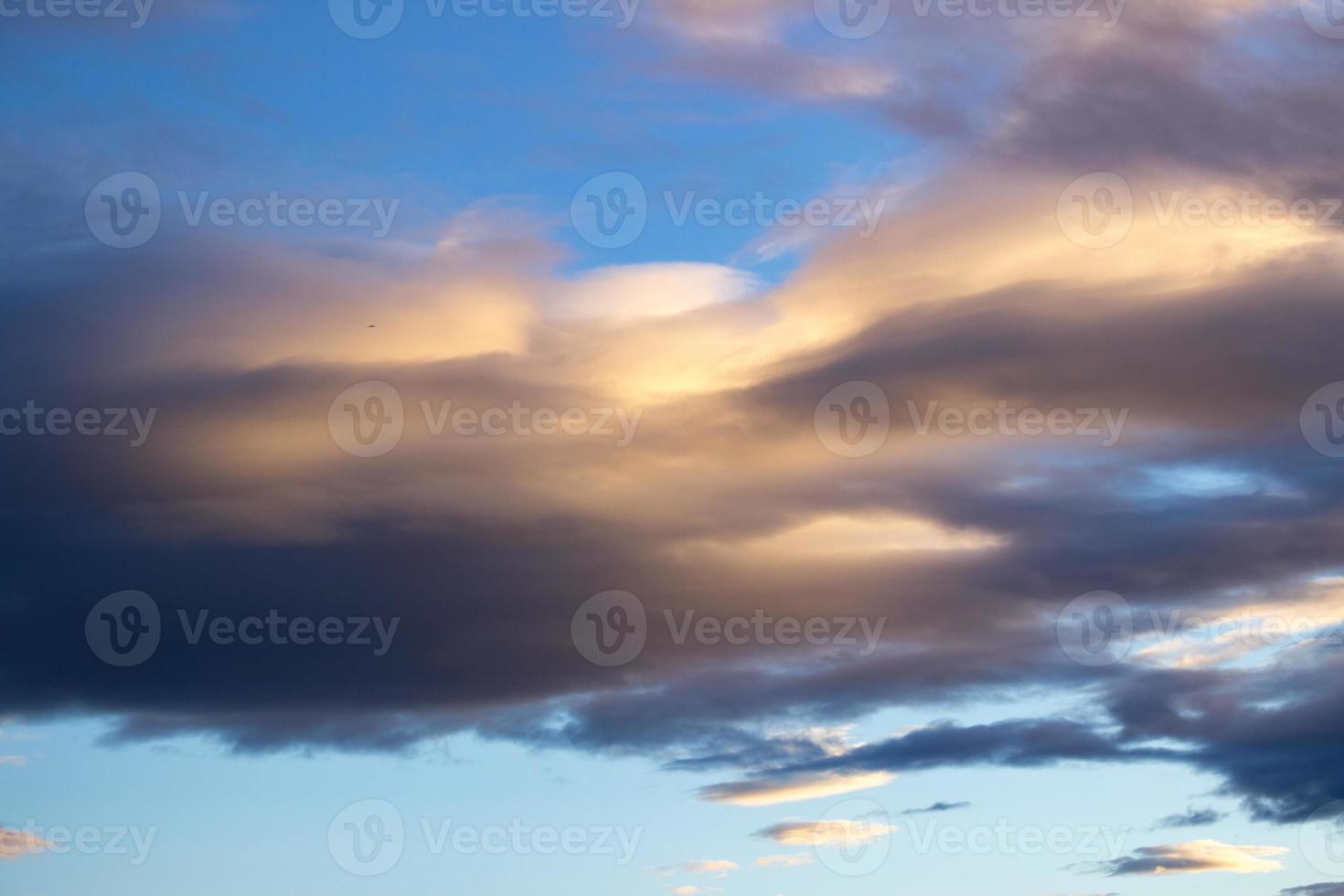 Beautiful evening sky background. Clouds in the sky during the sunset. photo