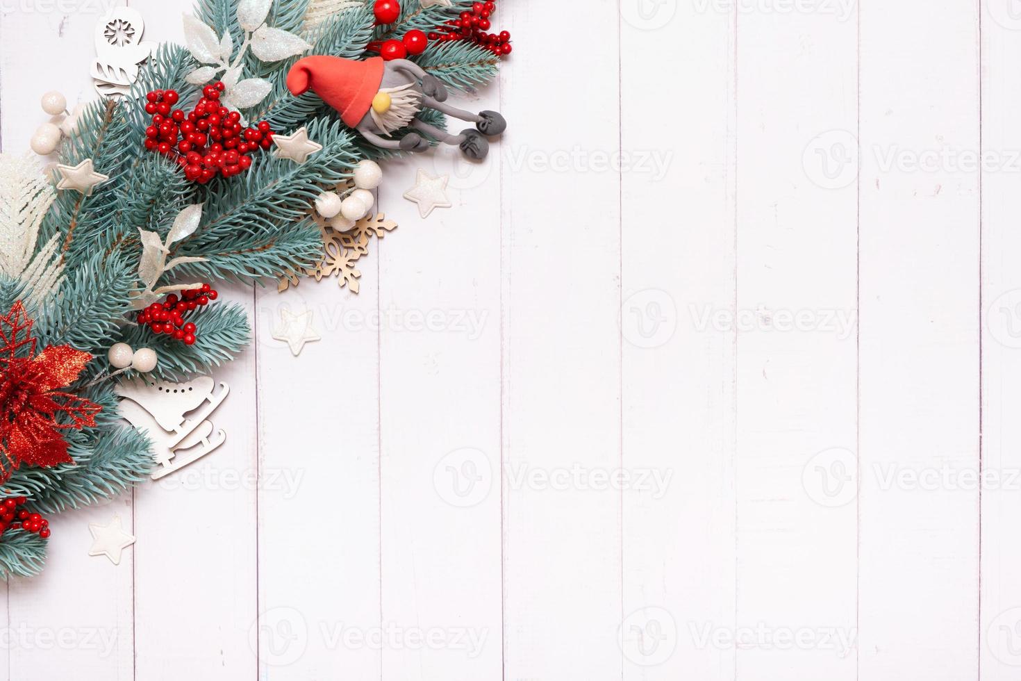 Christmas composition made from pine tree, stars and festive decorations top view. Christmas flat lay photo