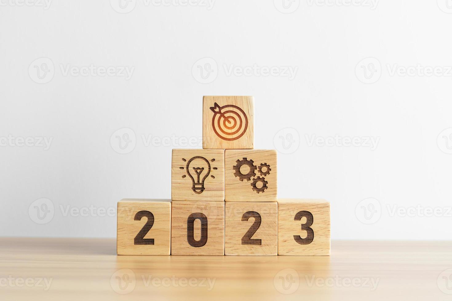 2023 wood block with business goal, plan. Action strategy, target, mission, teamwork, idea and New Year start concept photo