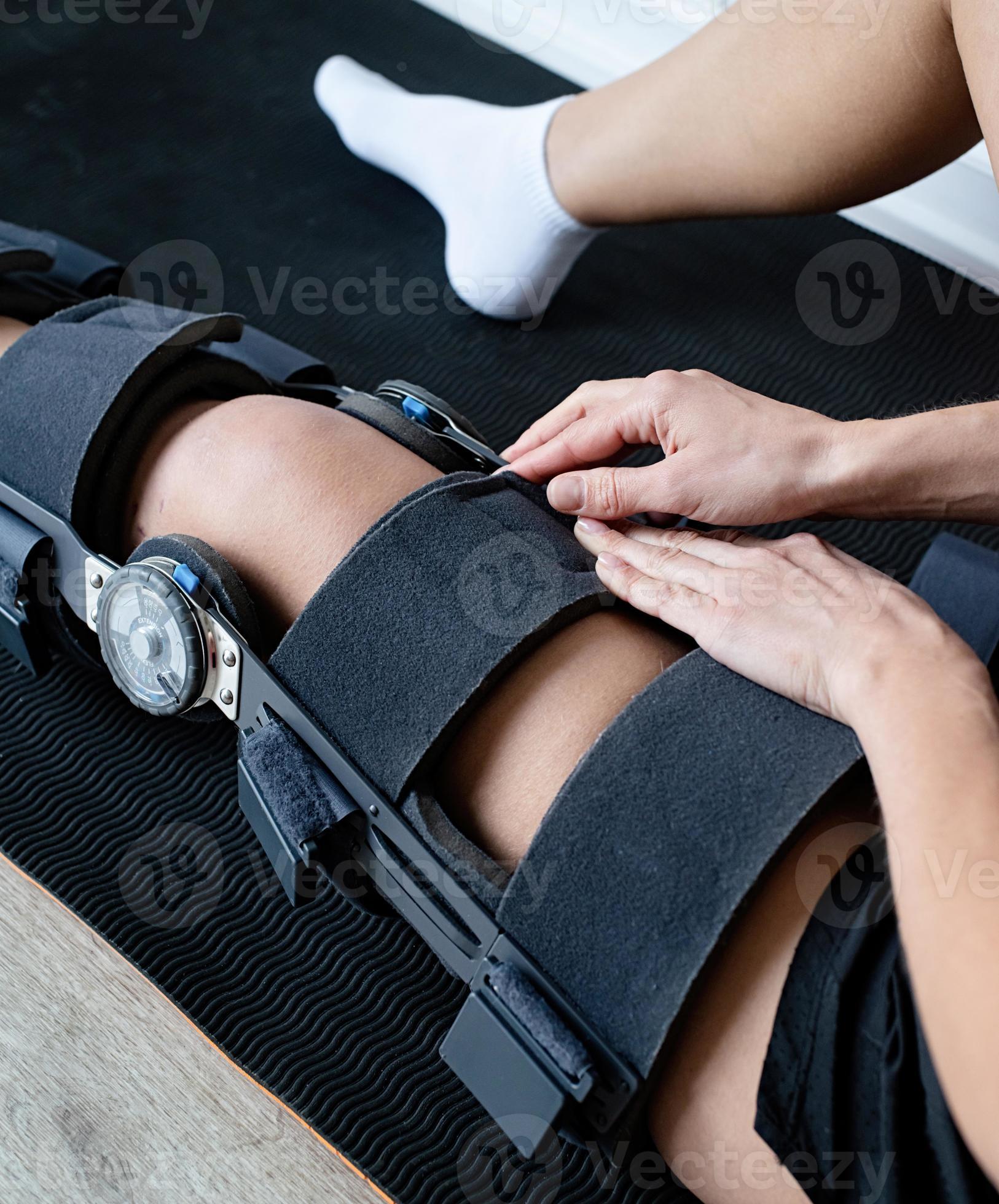 Female buckling knee orthosis or knee support brace after surgery on leg  19655550 Stock Photo at Vecteezy