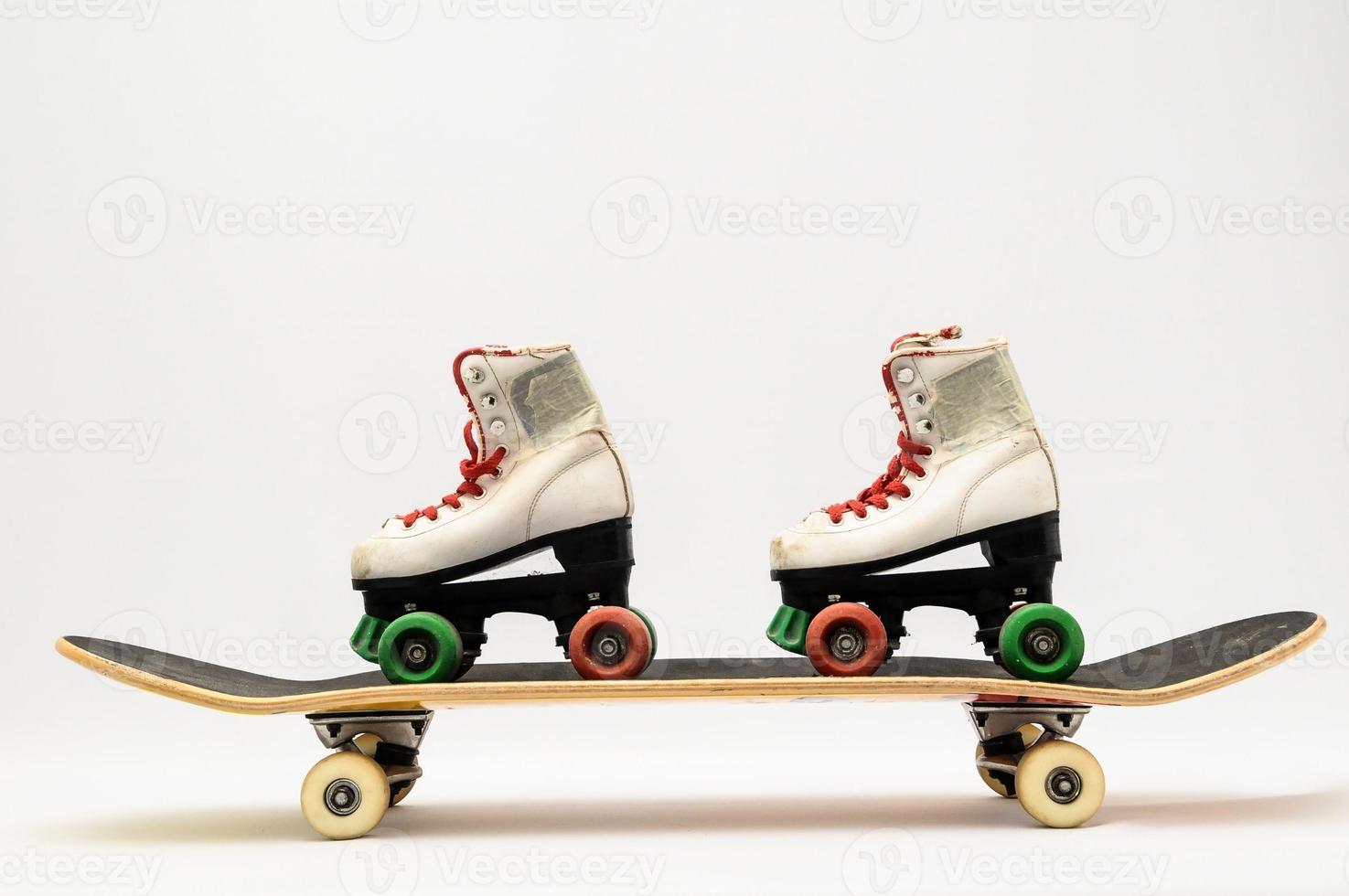 Roller skates on skateboard photo