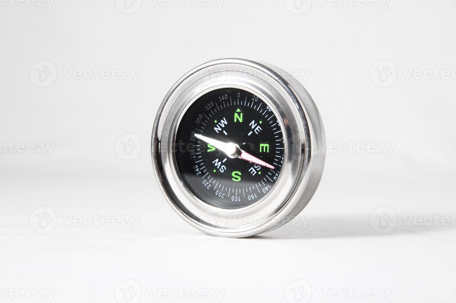 Compass on white background photo