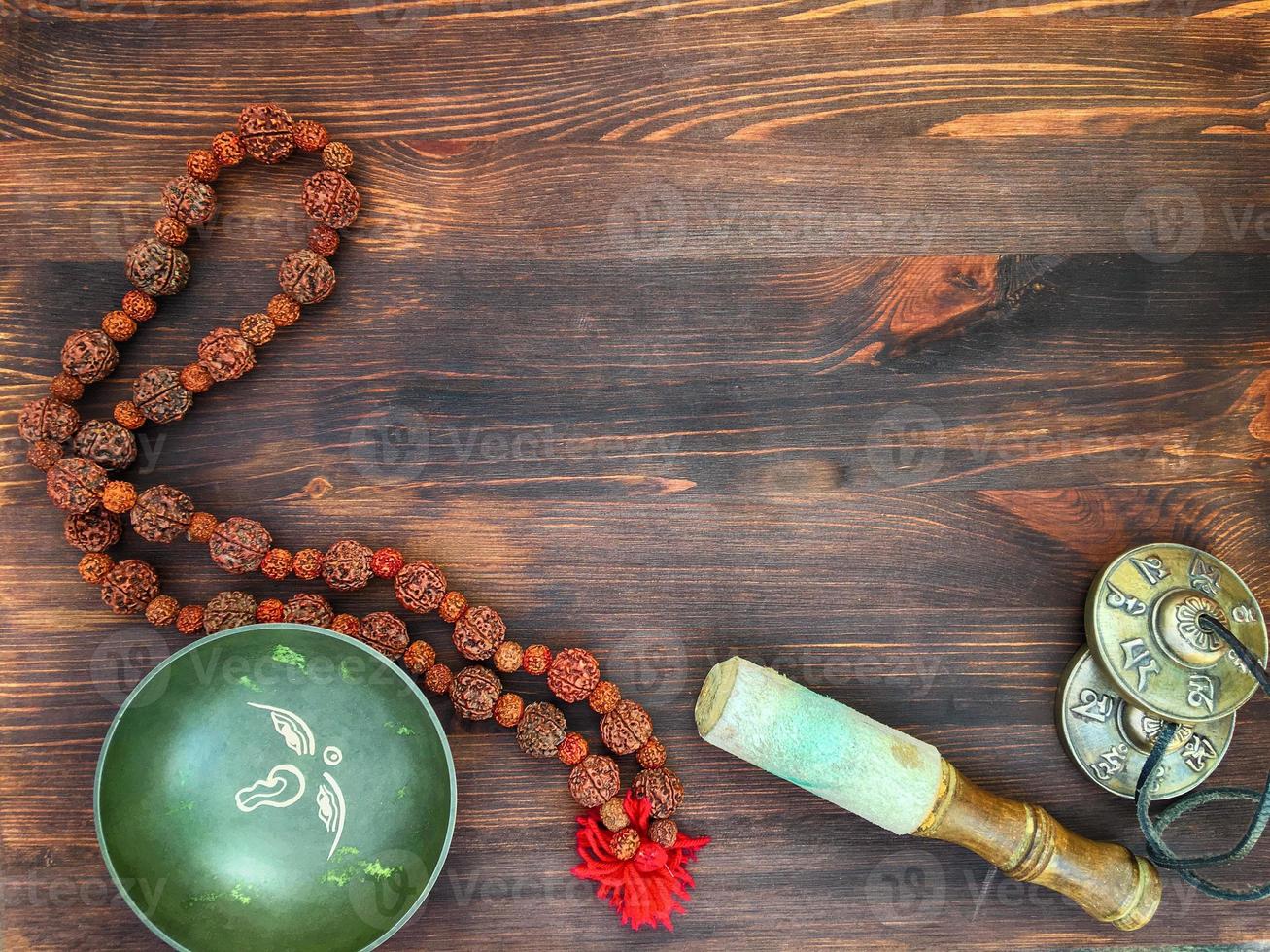 Singing Bowl, copper drums cymbals, Rudraksha beads for meditation photo