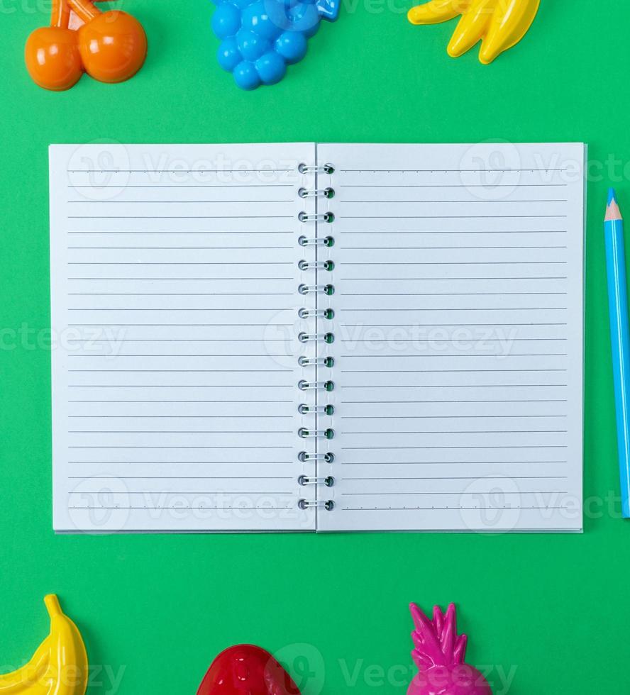 open notebook with blank white sheets in line photo