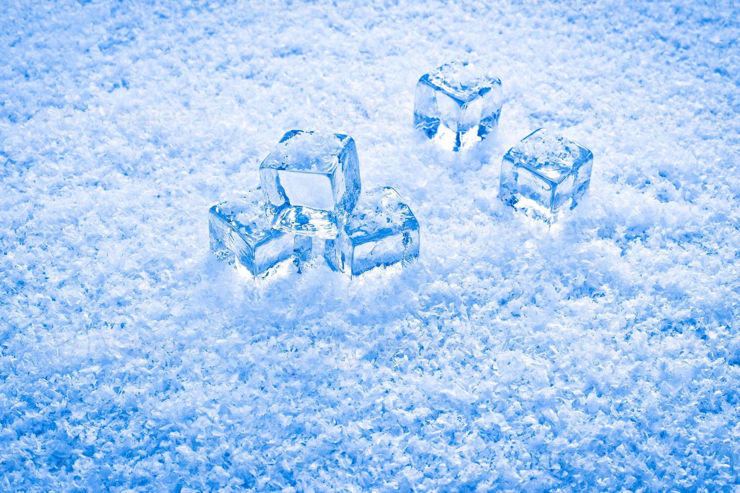 wet ice cubes and snow photo