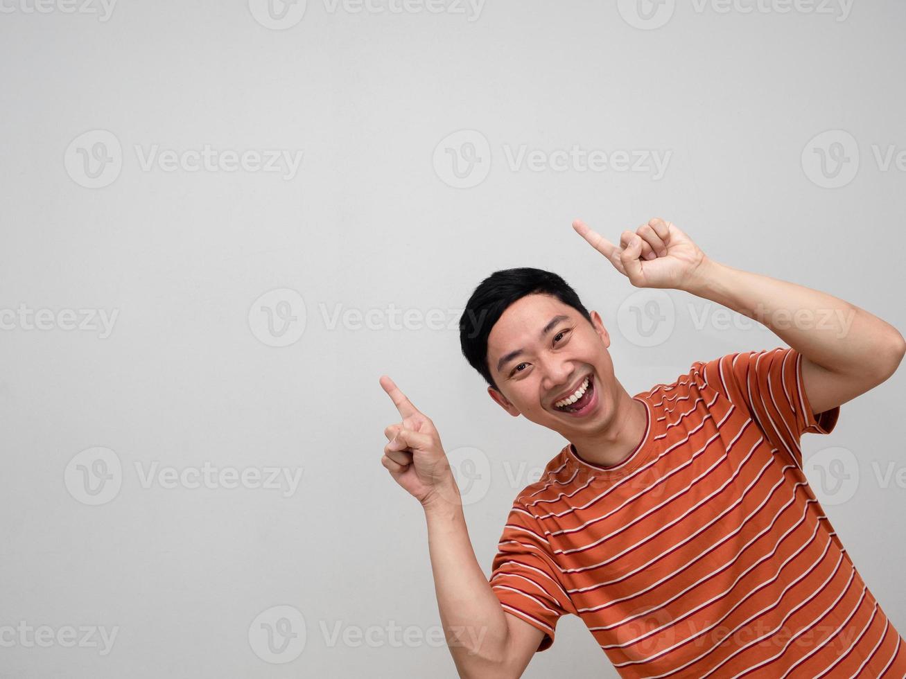 Cheerful asian man orange striped shirt happy smile show point finger isolated photo